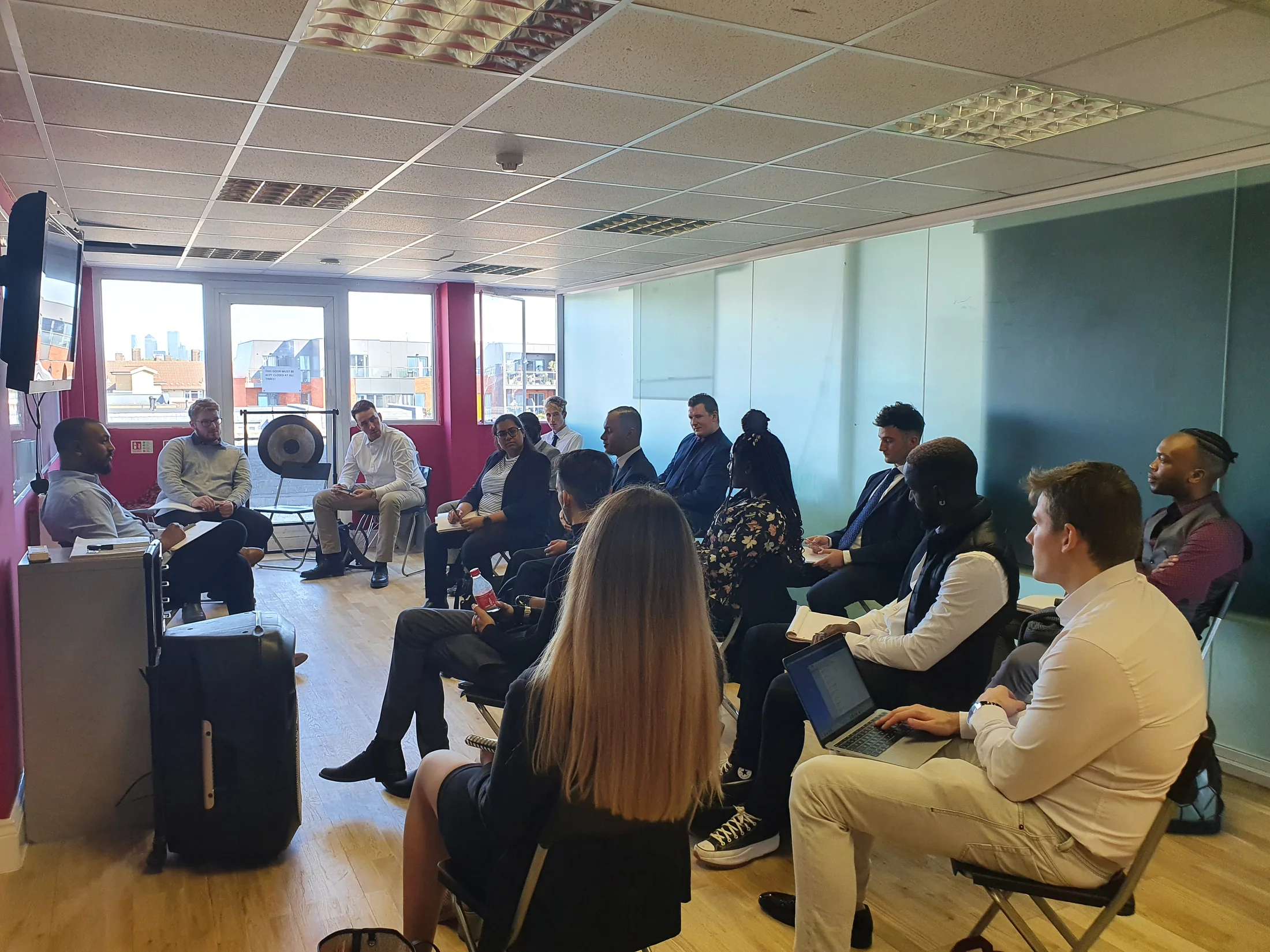 A speaker addressing a team meeting